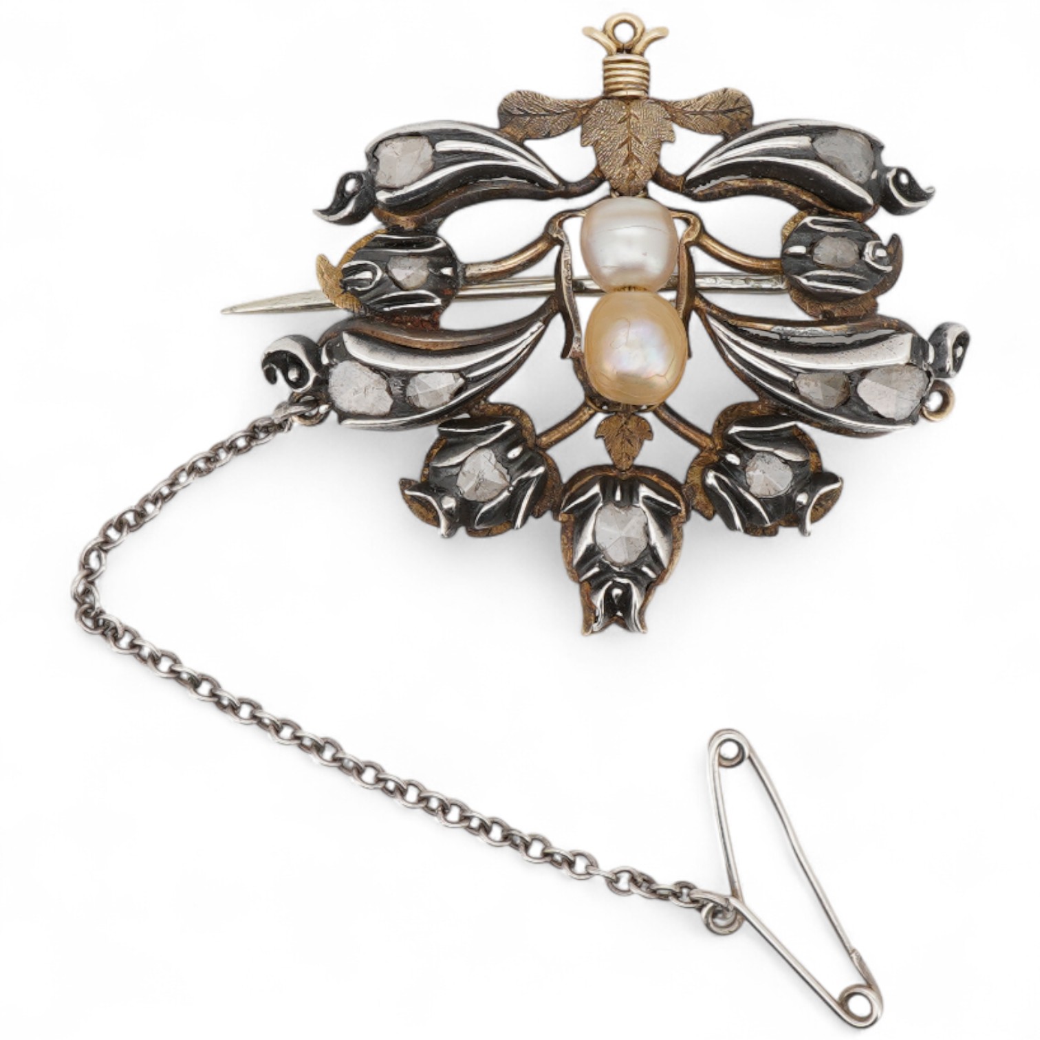 A yellow and white metal, pearl and rose cut diamond set bouquet brooch, width 36mm, pearls untested, with an associated Edward Tessier gilt tooled red leather fitted box.